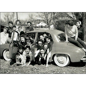 This is a picture of two sororities trying to set a record by jamming 27 women into a Renault the picture was taken in Sioux City IA around 1958.