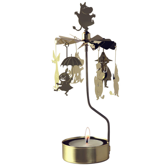 Gold Rotary Candle with Moomin Characters hanging and a lite flame. Moomin is standing on the top of the candle holder.