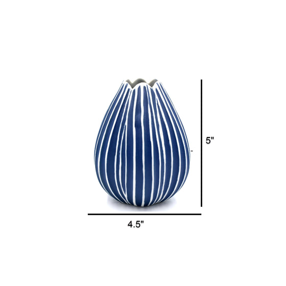 The image displays a vase with a distinctive design featuring vertical blue stripes on a white background. The vase has a rounded shape with a somewhat narrowed opening at the top, creating an elegant profile. Also pictured are the dimensions of the vase that read 4 ½” wide by 5” tall.