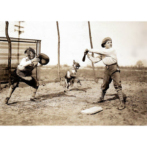 The front of the card shows two young boys playing baseball using a makeshift diamond with a chicken wire backstop and a scrap of wood as a home plate, a batter a catcher and their plucky four-legged friend eagerly waiting on the pitch.
