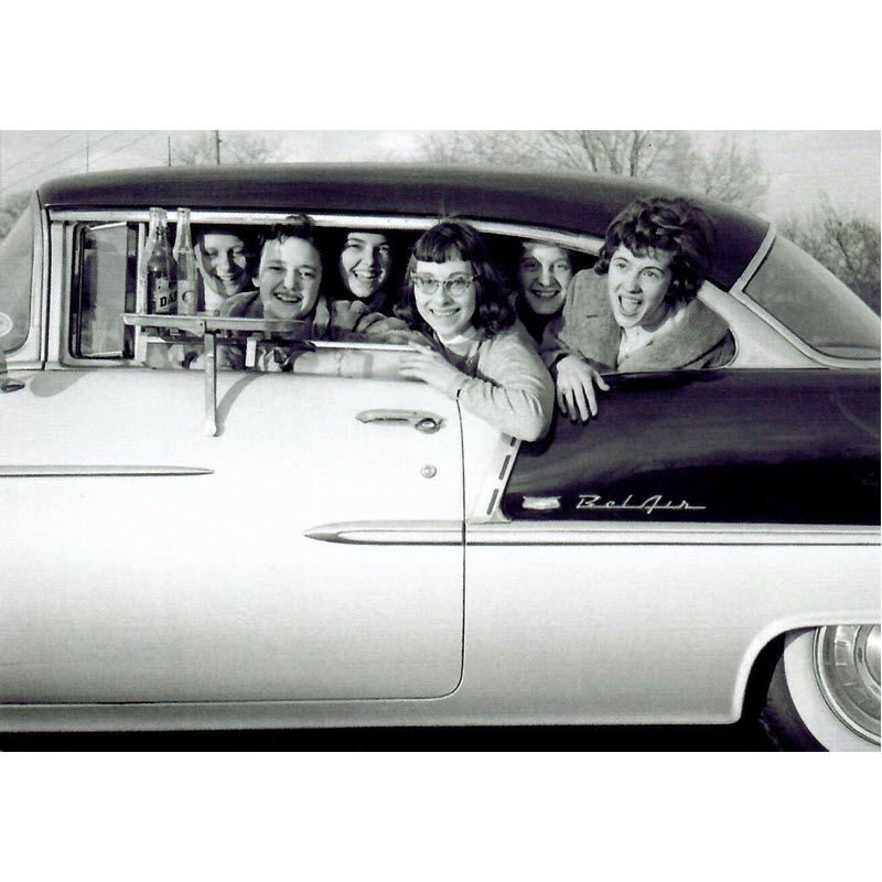 Six young women crammed into a Belair car in the year 1956 in Gary Indiana.