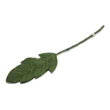  This is an image of a Felted Wool Leaf with hand stitched veins and a felted wool wrapped wire stem. The label attached to the stem indicates proof of Gry & Sif authenticity. 